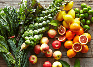 a group of fruits and vegetables on a wood surface Healthy Weight Loss Diets Chester